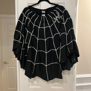 Grand in road woman spider web poncho OS